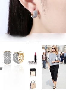 Detail of gold zircon ear clips with micro-paved rhinestones for a romantic fashion style