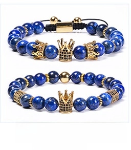 Detail of 8mm lapis lazuli beaded bracelets featuring gold crown with micro-set zircon