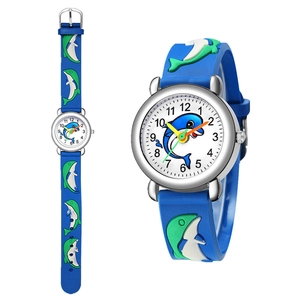 Detail of blue kids watch with 3D dolphin silicone strap and clear numeric dial