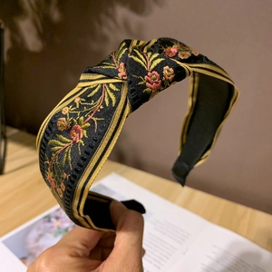Ethnic style embroidered knot headband with vintage floral patterns and golden stripes