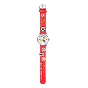 Detail of red silicone watch strap featuring 3D embossed soccer pattern for kids