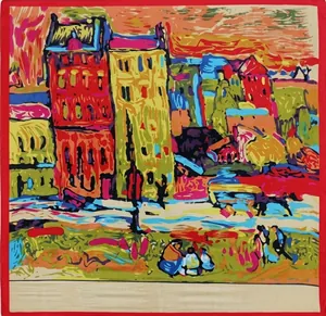 Close-up of artistic silk scarf featuring vibrant impressionist architecture and red borders