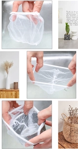 Close-up showing the elastic mesh material and usage of sink drain filter bags