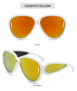 Vue de face et à 45 degrés de lunettes de soleil blanches avec verres dégradés orange