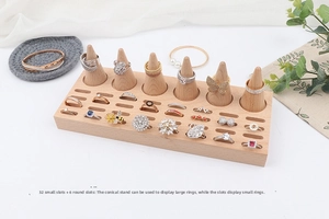 Macro detail of wooden ring display holder with 32 slots and 6 conical beechwood stands