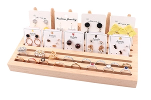 Tiered beech wood display stand with ring slots and earring card holders