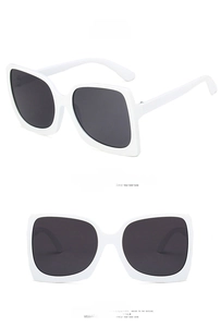 Detailed front and side views of oversized white square sunglasses with grey lenses