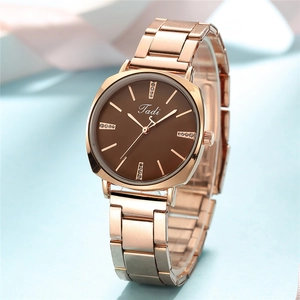 Fashionable rose gold women's quartz watch with deep brown dial and crystal accents