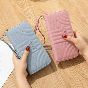 Long PU leather wallet for women with wave stitching and wrist strap in pink and blue