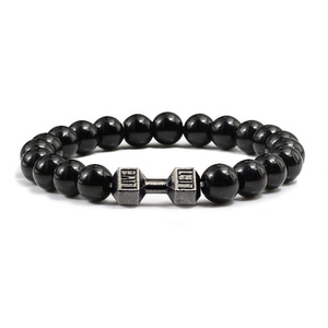Detail shot of black beaded bracelet with silver dumbbell charm featuring LIVE LIFT engraving