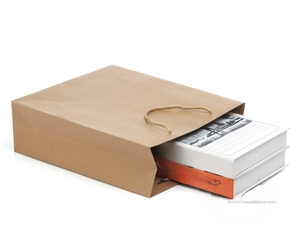 Brown kraft paper gift bag with cord handles showing large capacity and heavy load support