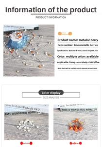 Detailed view of 8mm pearlescent and orange metallic berries on wire stems for home decor