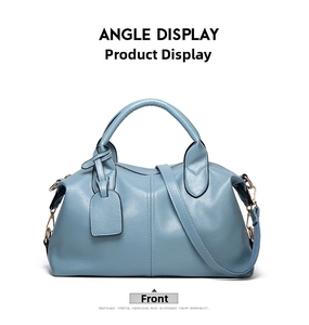Front view of Morandi blue lychee leather Boston bag with soft rolled handles