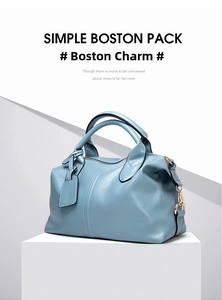 Detailed macro view of the light blue lychee pattern leather on a Boston handbag