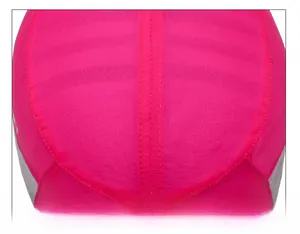 Macro detail of high-quality stitching and sewing on the crown of a pink athletic cap
