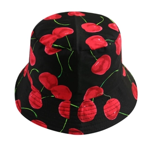 Close-up of black bucket hat with red cherry print and reinforced stitching detail