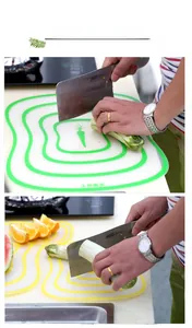 Flexible kitchen cutting board set showing non-slip texture and vegetable icons