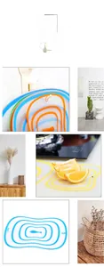 Flexible plastic cutting mats with colorful wavy patterns and convenient hanging holes
