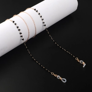 Chaîne de lunettes dorée faite main avec cristaux triangles noirs sur cordon métallique