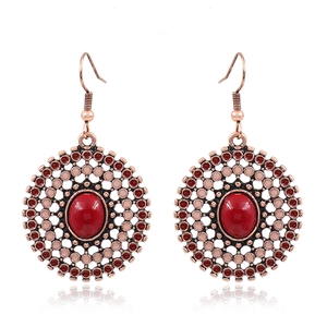 Boucles d'oreilles bohèmes vintage avec pierres rouges ovales en métal bronze antique
