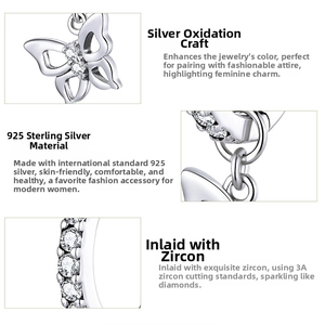 Macro detail of S925 sterling silver butterfly earring featuring 3A cubic zirconia stones