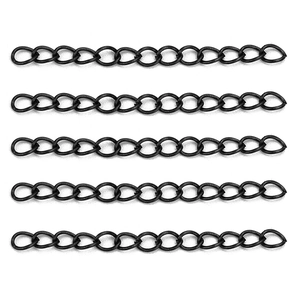 Detailed macro view of five parallel black metal jewelry extender chains for DIY accessory projects