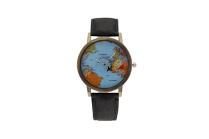 Close-up of world map dial quartz watch with airplane hand and black leather strap