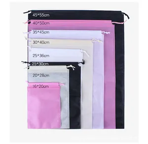 Size guide for non-woven drawstring bags showing various dimensions from 16x20cm to 45x55cm
