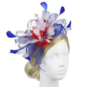 Detailed close-up of mesh fascinator with red, white, and blue feathers and pearls