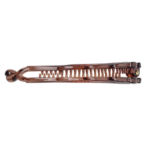 Close-up of durable brown resin banana hair clip with strong hinge and comb teeth detail