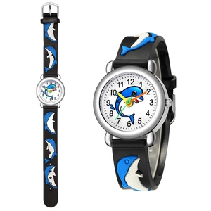 Detailed 3D blue dolphin relief on black silicone strap of kids' quartz watch