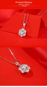 Macro shot of 925 sterling silver snowflake pendant necklace with moissanite crystals