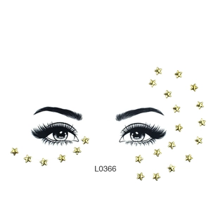L0366 gold star face gem stickers for eye and cheek decoration on a white background