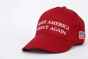 Close-up of a red baseball cap featuring white 3D embroidery and USA flag detail