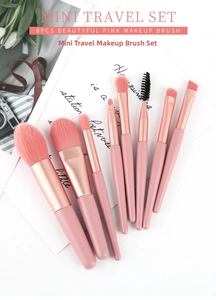 Macro view of 8pcs pink travel makeup brushes set with rose gold metal ferrules