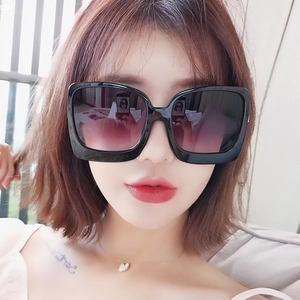 Chic oversized square sunglasses with black frames and purple gradient lenses for women