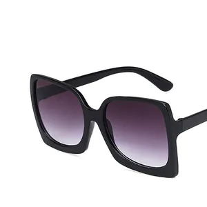 Retro oversized square sunglasses with black frames and purple gradient lenses