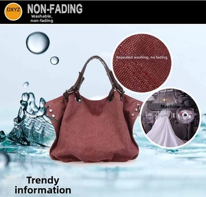 Detail showing high-capacity wine red canvas tote with adjustable straps and metal rivets