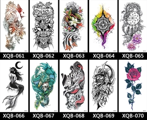 Grid display of temporary tattoos featuring floral, animal, and Japanese motif designs