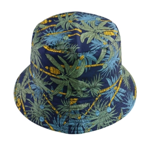 Detailed close-up of dark blue bucket hat with tropical palm tree patterns on twill fabric