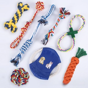 Close-up of 8 durable braided cotton rope dog toys in various shapes for pet teeth cleaning