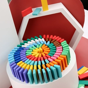 Colorful wooden domino set blocks in spiral stack on display for educational play