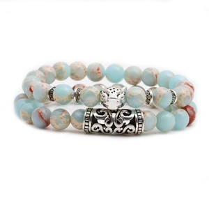Blue-grey natural stone beaded bracelet set with leopard head and hollow metal tube