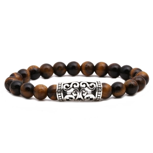 Natural tiger's eye beaded bracelet with silver retro scroll-textured metal barrel charm