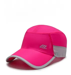 Detail of pink quick-dry baseball cap featuring breathable mesh and SPORT logo embroidery