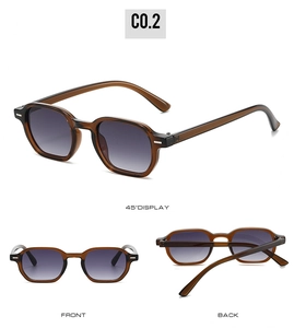 Detail view of vintage amber brown sunglasses with gradient lenses and hinge mechanics