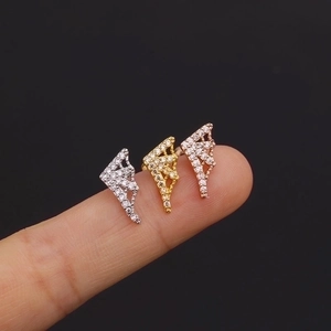 Cubic zirconia dinosaur flower stud earrings in silver, gold, and rose gold finishes
