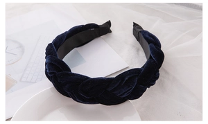 Detailed view of navy blue velvet braided headband with soft texture and non-slip lining
