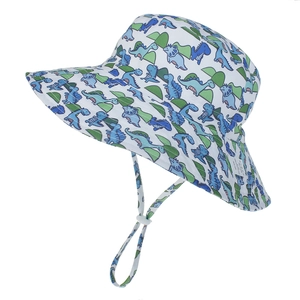 Detail of white dinosaur print bucket hat for kids with adjustable windproof safety drawstring