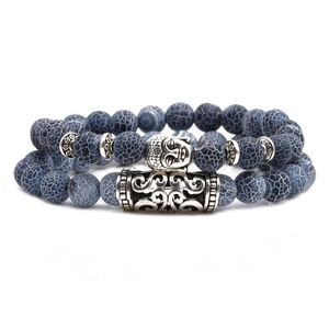 Weathered stone owl and Buddha head beaded bracelet set with silver lion and elephant charms